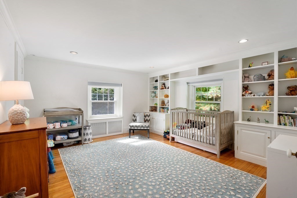11 Hillside Road Wellesley, MA 02481 - Photo 19 of 29 a bedroom with furniture and a window