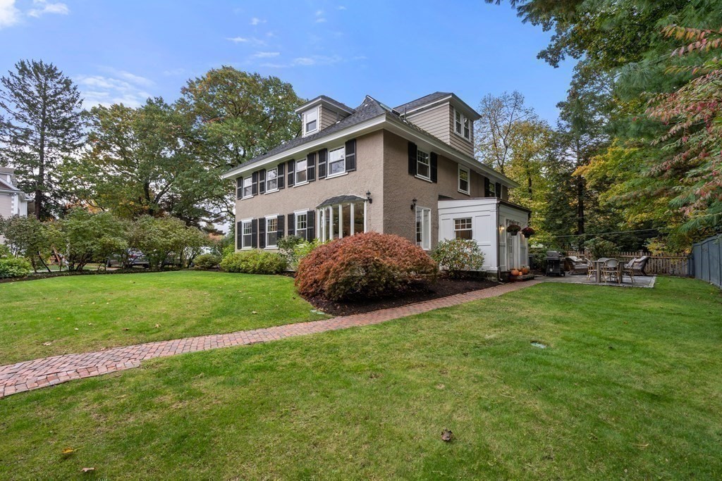 11 Hillside Road Wellesley, MA 02481 - Photo 27 of 29 a house that is sitting in the grass