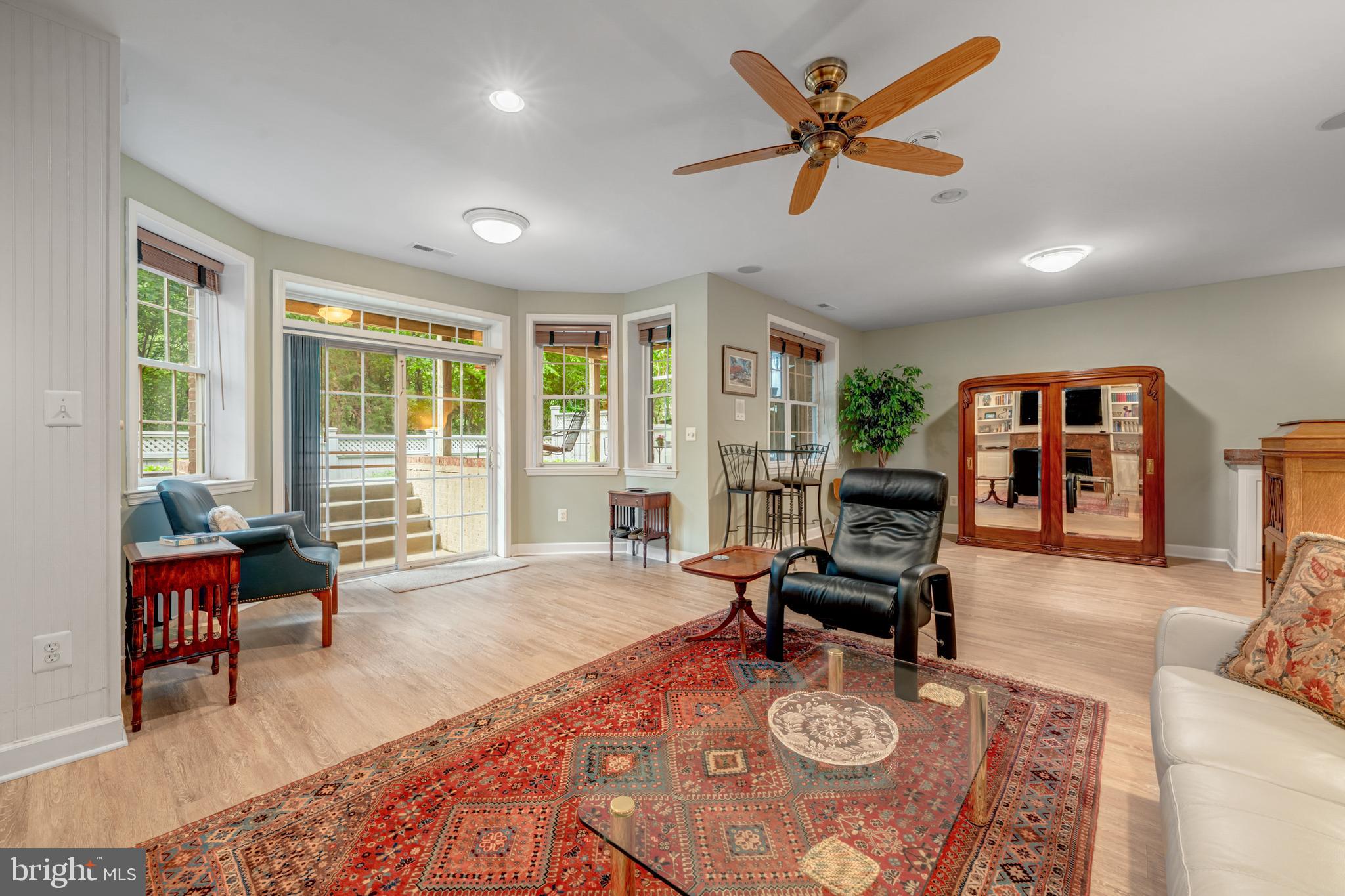 1925 Logan Manor Drive Reston, VA 20190 - Photo 33 of 61 a living room with furniture and floor to ceiling windows