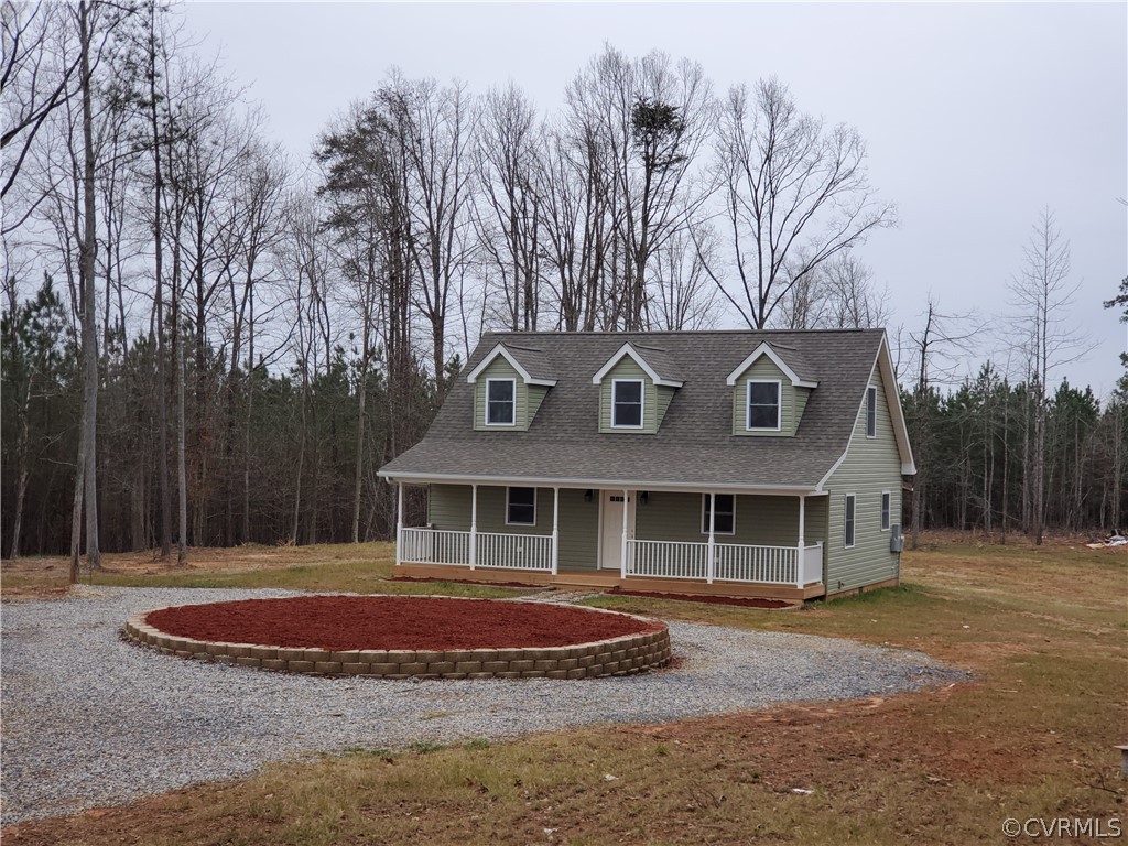 488 Guinea Road Farmville, VA 23901 - Photo 1 of 22 a front view of a house with a garden