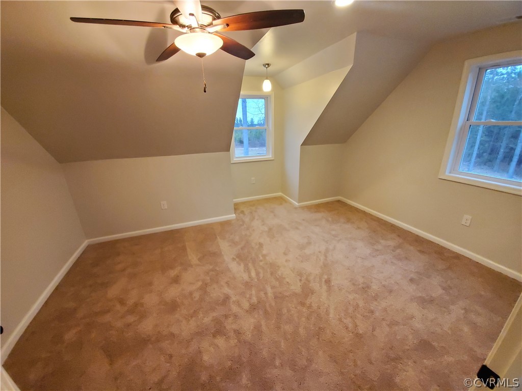 488 Guinea Road Farmville, VA 23901 - Photo 13 of 22 an empty room with windows and fan