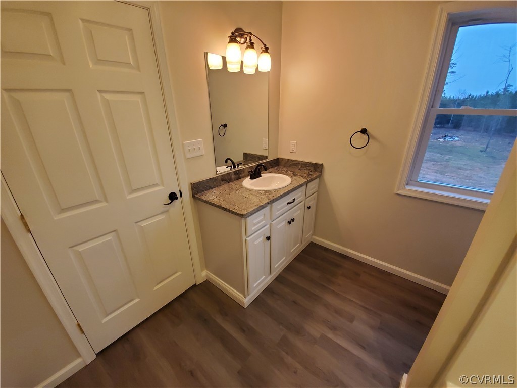488 Guinea Road Farmville, VA 23901 - Photo 15 of 22 a bathroom with a sink and a mirror