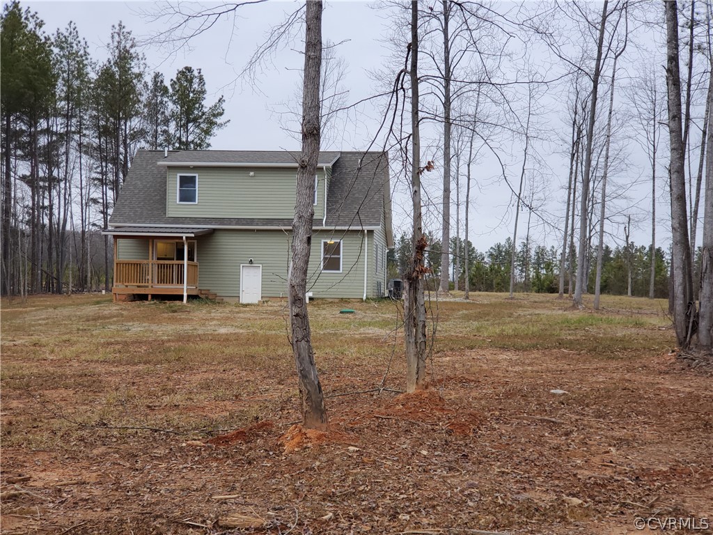 488 Guinea Road Farmville, VA 23901 - Photo 21 of 22 a view of a house with backyard and trees