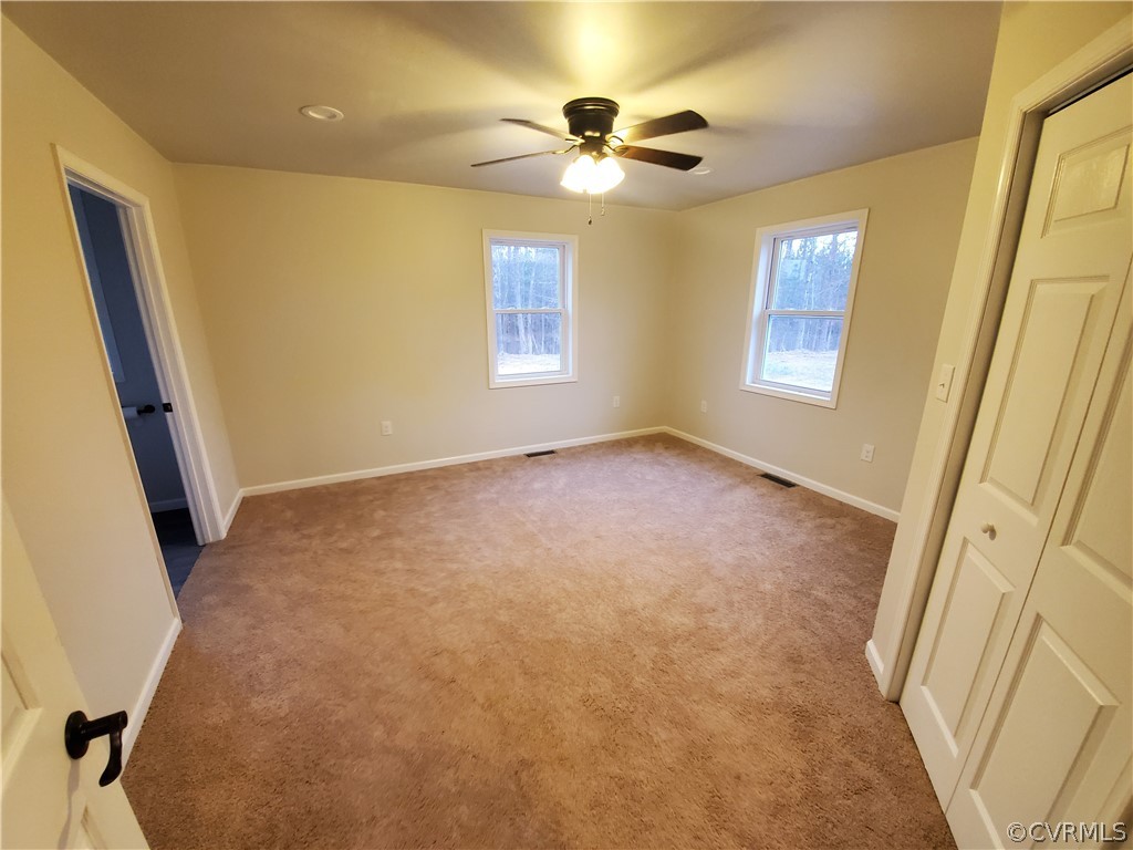 488 Guinea Road Farmville, VA 23901 - Photo 6 of 22 a view of an empty room with a window