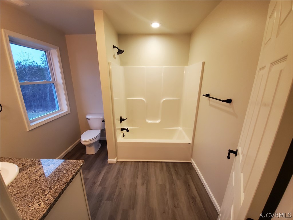 488 Guinea Road Farmville, VA 23901 - Photo 7 of 22 a bathroom with a granite countertop sink toilet and shower