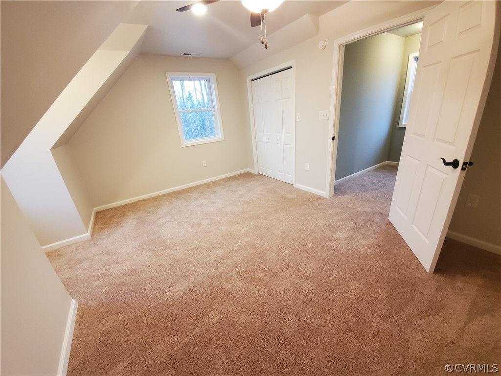 488 Guinea Road Farmville, VA 23901 - Photo 10 of 22 an empty room with windows and closet