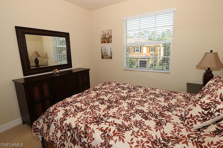 6525 Monterey Point, Unit 203 Naples, FL 34105 - Photo 16 of 25 View of carpeted bedroom