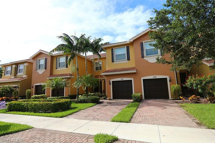 6525 Monterey Point, Unit 203 Naples, FL 34105 - Photo 19 of 25 View of property with a garage