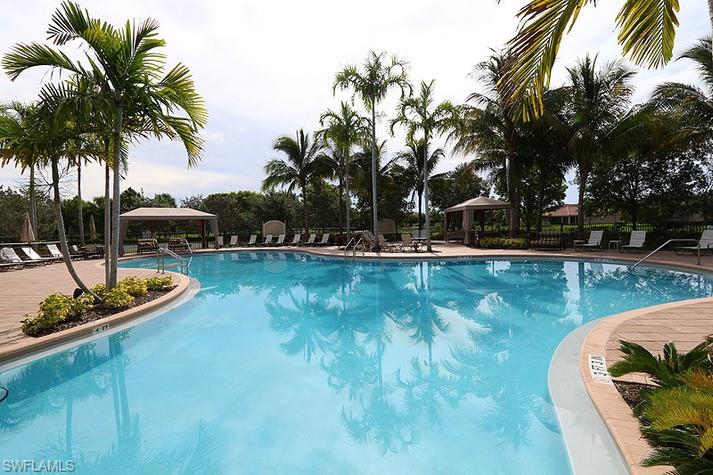6525 Monterey Point, Unit 203 Naples, FL 34105 - Photo 20 of 25 View of swimming pool featuring a gazebo