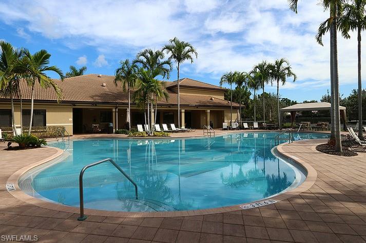 6525 Monterey Point, Unit 203 Naples, FL 34105 - Photo 21 of 25 View of pool with a patio area