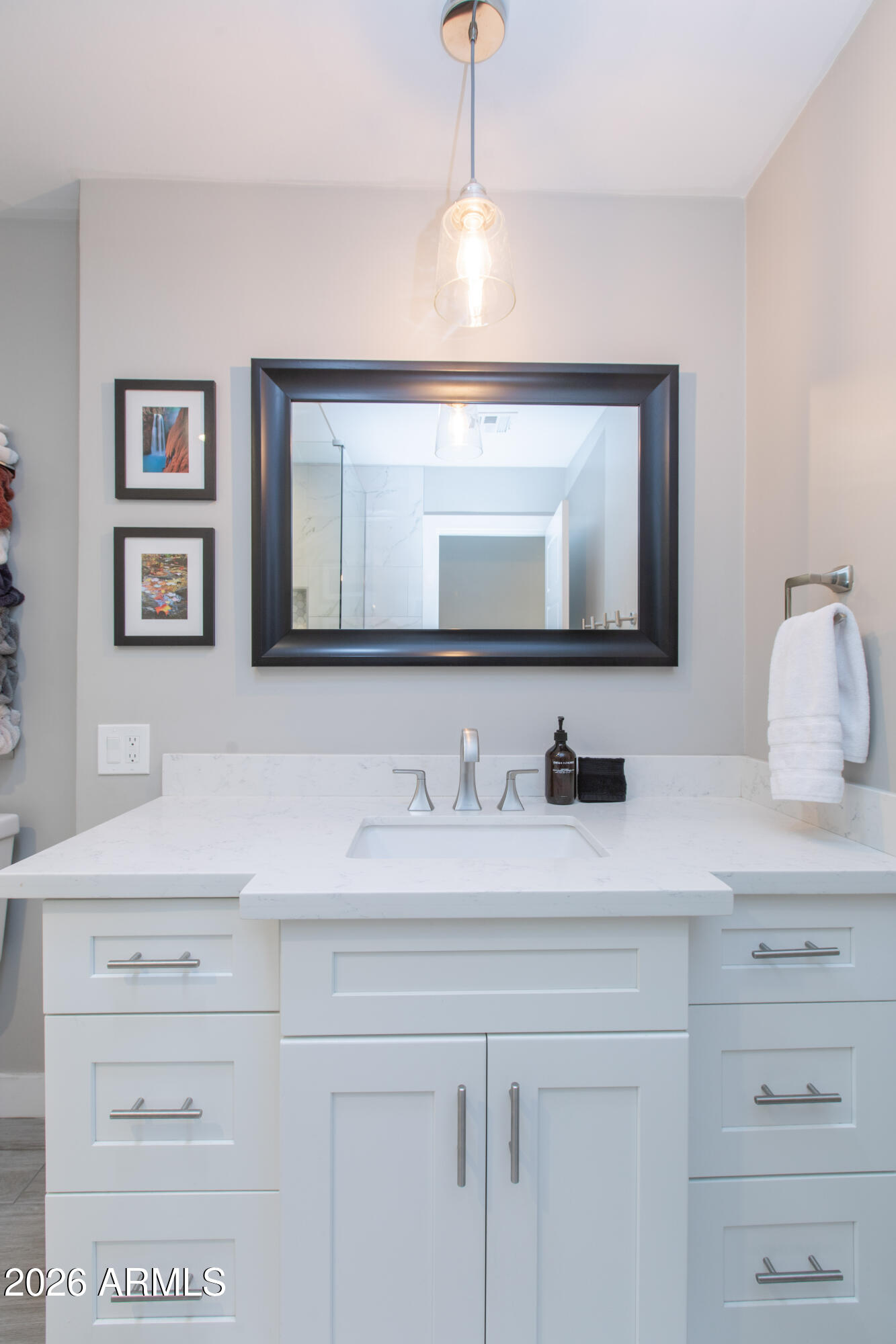 5541 East Cheery Lynn Road Phoenix, AZ 85018 - Photo 33 of 69 a bathroom with a sink vanity and a mirror