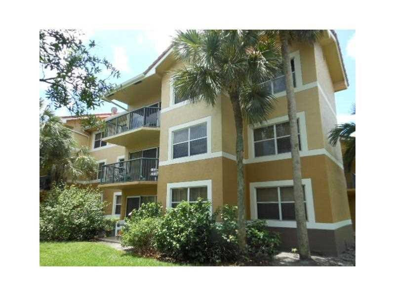 9001 Wiles Road, Unit 206 Coral Springs, FL 33067 - Photo 12 of 14 a view of a multi story building