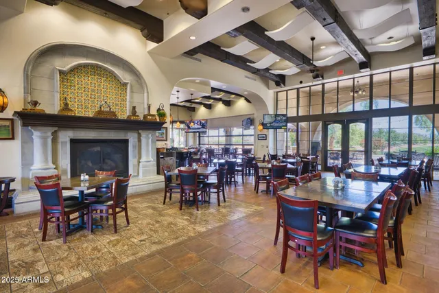 a view of a lake with houses in the background