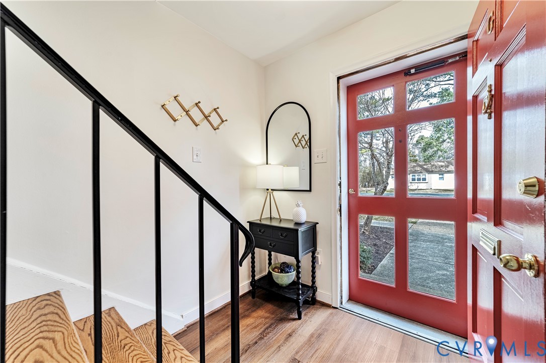 9111 Derbyshire Road, Unit G Henrico, VA 23229 - Photo 2 of 42 a view of entryway and hall with wooden floor