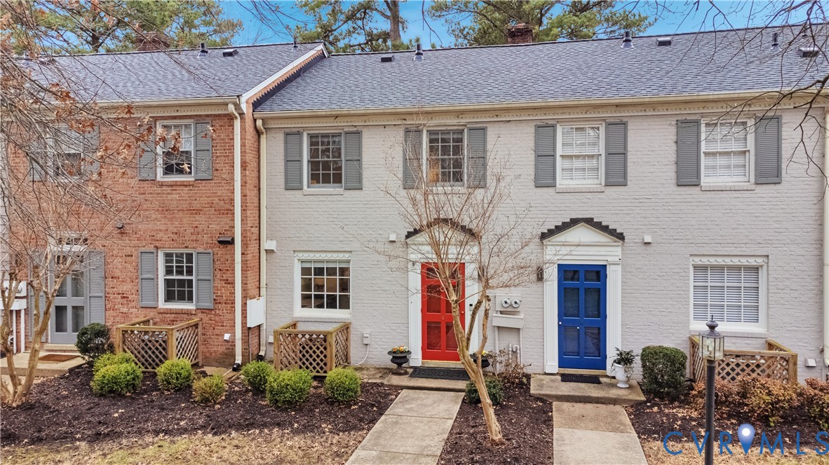 9111 Derbyshire Road, Unit G Henrico, VA 23229 - Photo 27 of 42 a front view of a house with garden