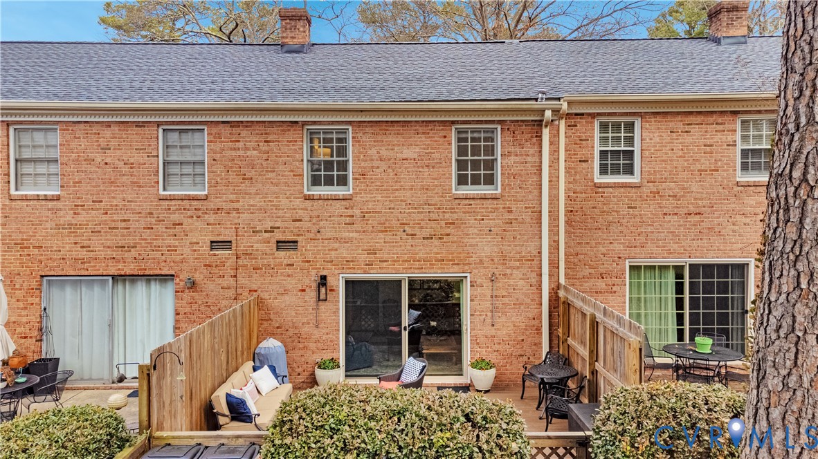 9111 Derbyshire Road, Unit G Henrico, VA 23229 - Photo 31 of 42 a front view of a house with a yard