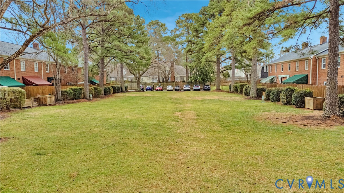 9111 Derbyshire Road, Unit G Henrico, VA 23229 - Photo 39 of 42 a view of a street with houses