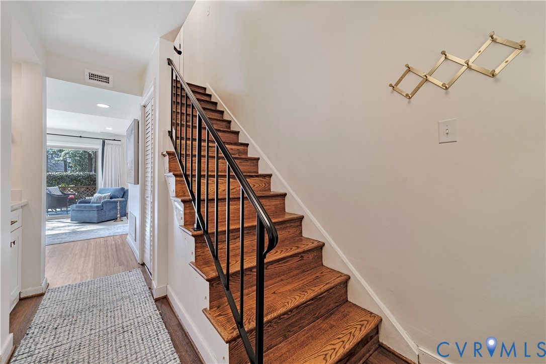 9111 Derbyshire Road, Unit G Henrico, VA 23229 - Photo 10 of 42 a view of entryway and hall with wooden floor