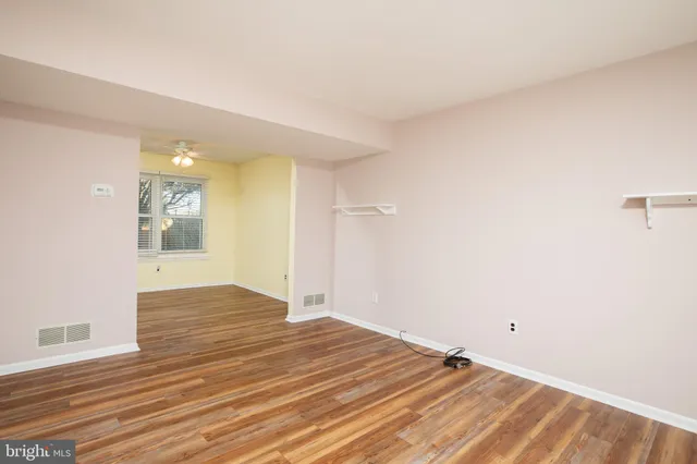 a view of an empty room and window