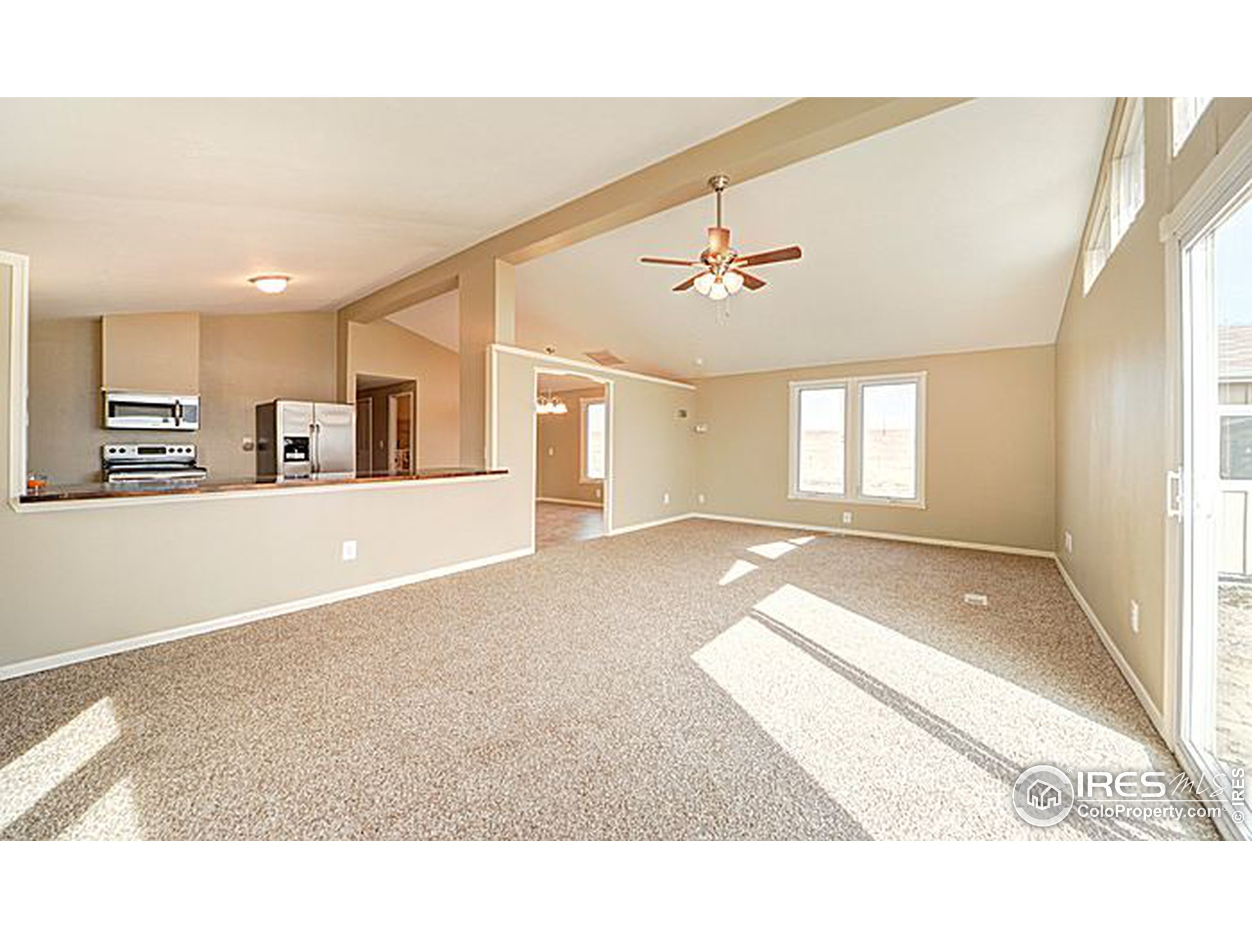8966 County Road Hudson, CO 80642 - Photo 12 of 25 a view interior of a house wooden floor and chandelier