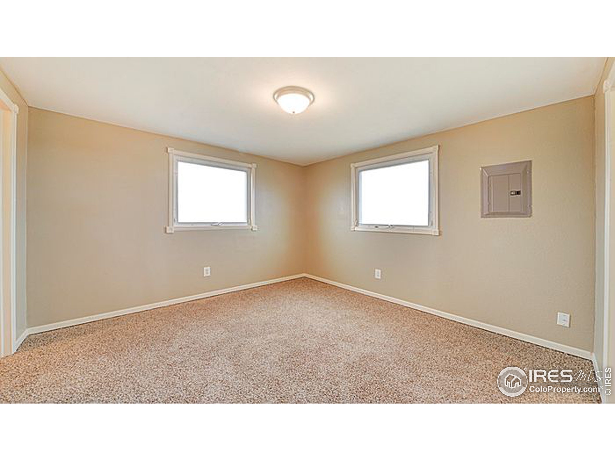 8966 County Road Hudson, CO 80642 - Photo 20 of 25 a black and white photo of a living room
