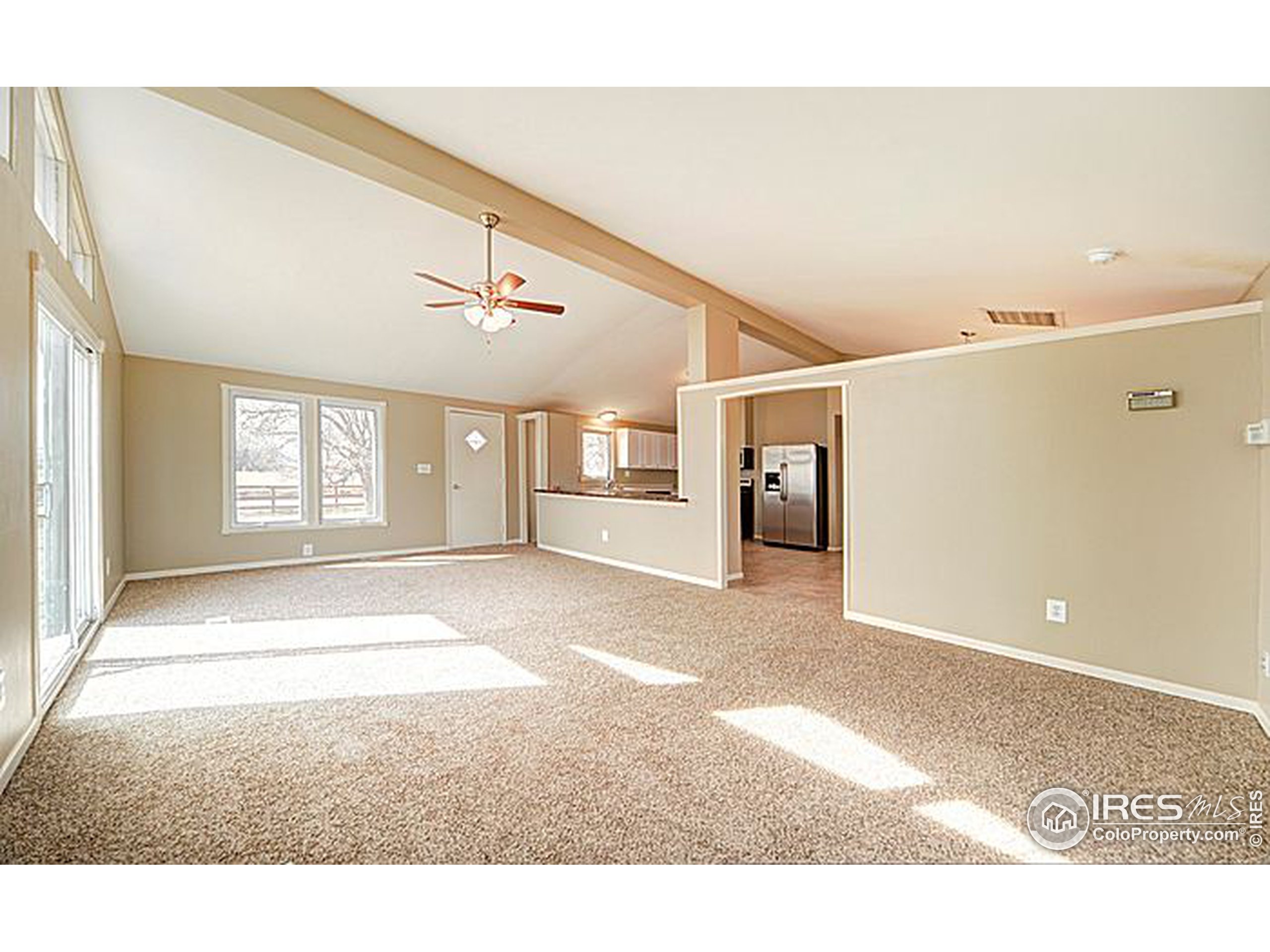 8966 County Road Hudson, CO 80642 - Photo 9 of 25 a view interior of a house wooden floor and windows