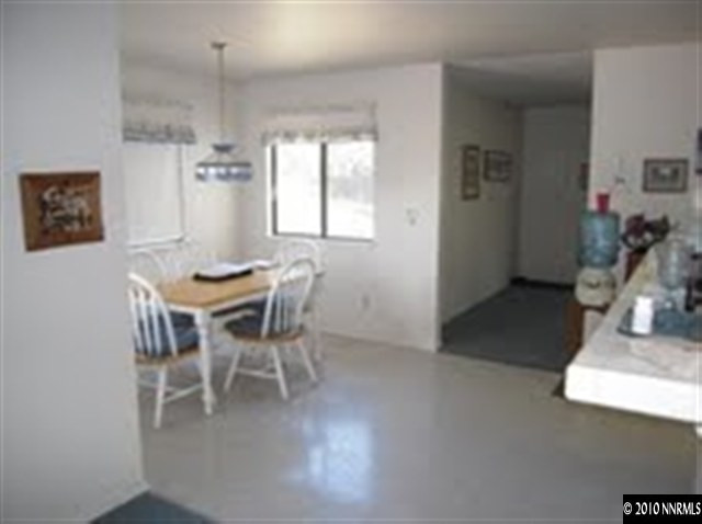 550 Holcomb Ranch Lane Reno, NV 89511 - Photo 5 of 7 a dining room with furniture and window