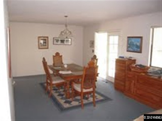 550 Holcomb Ranch Lane Reno, NV 89511 - Photo 6 of 7 a view of a dining room with furniture