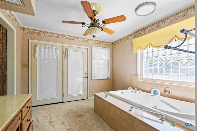 a view of a bench in a backyard