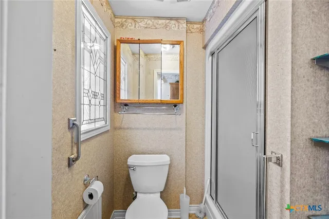 a swimming pool with outdoor seating and yard