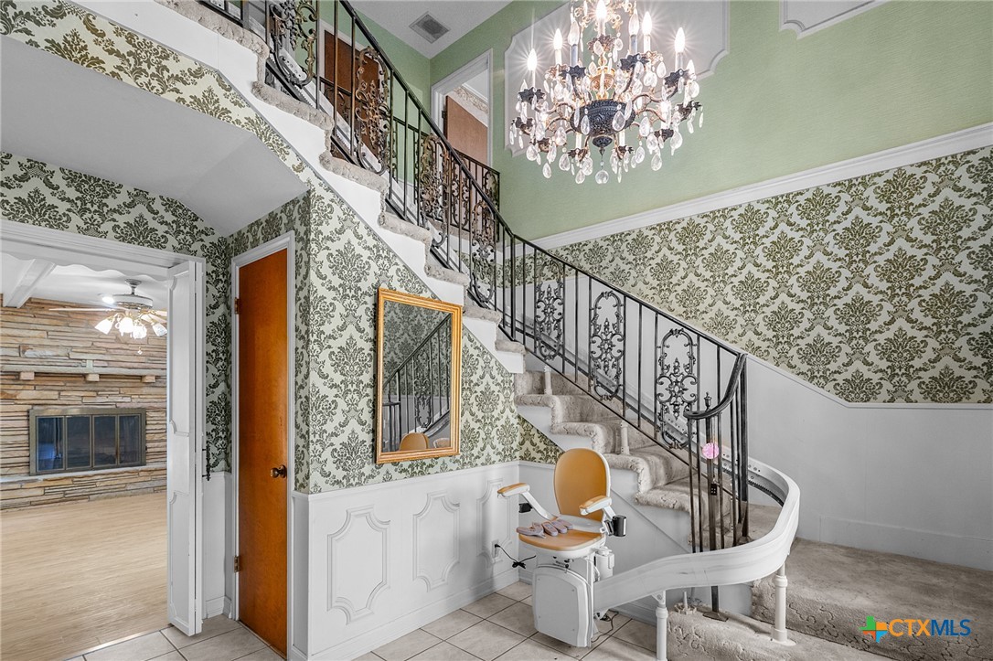 1101 Clark Street Yoakum, TX 77995 - Photo 4 of 48 a view of entryway and hall with wooden floor