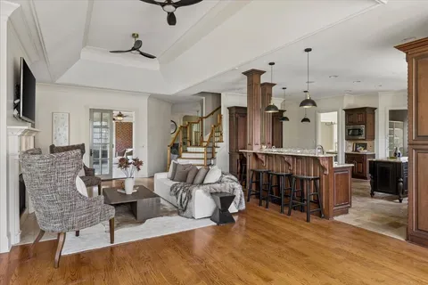 a view of a dining room with furniture and wooden floor