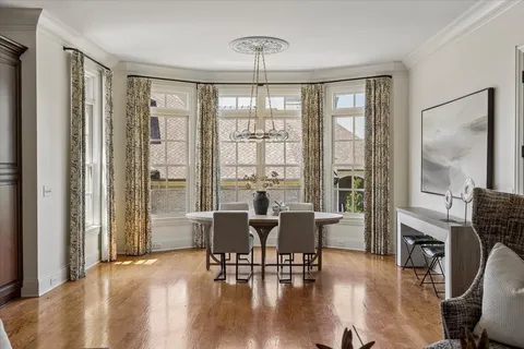 a view of a livingroom with furniture window and outside view