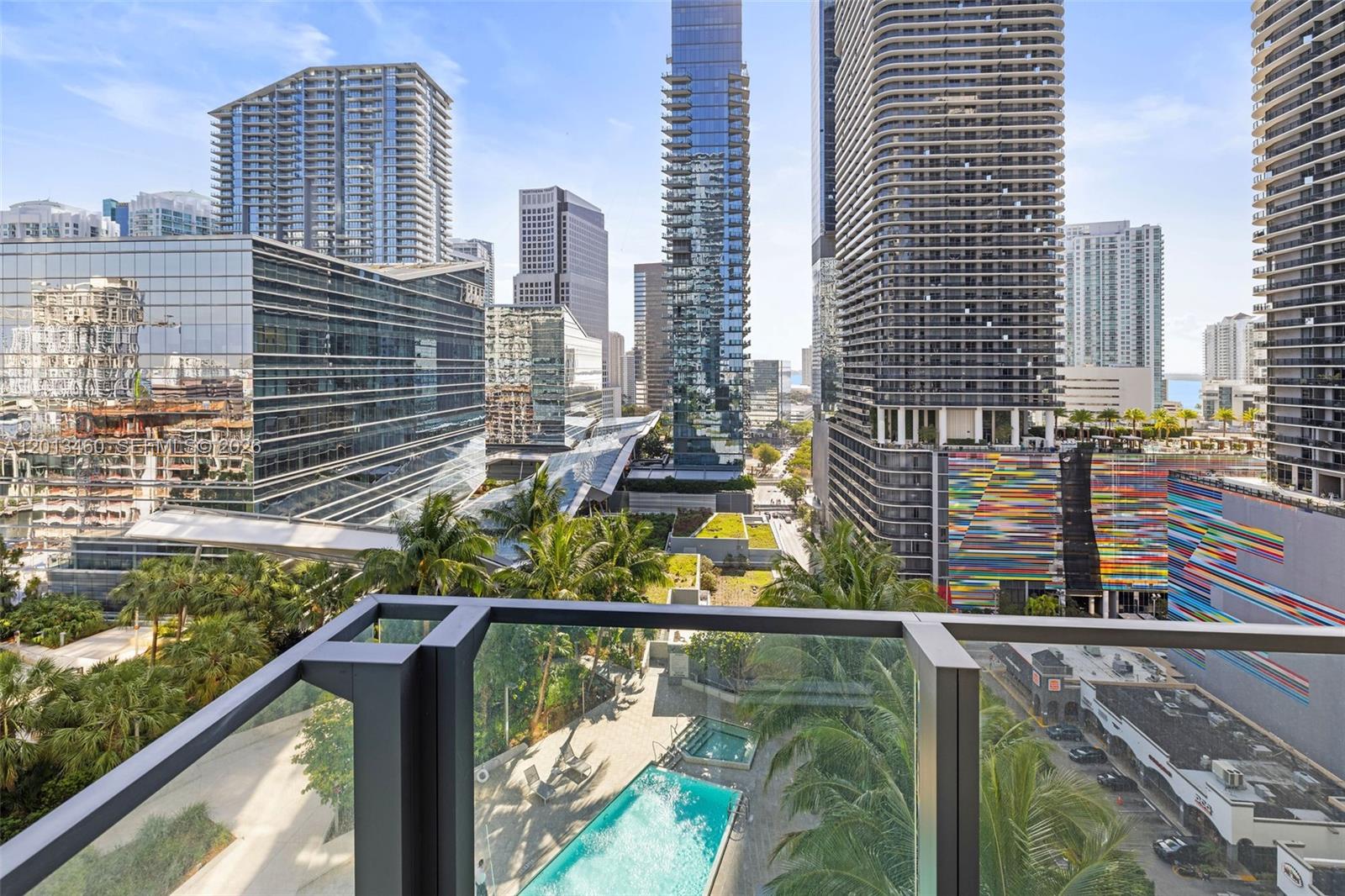 88 Southwest 7th Street, Unit 1201 Miami, FL 33130 - Photo 1 of 39 a view of city from a balcony