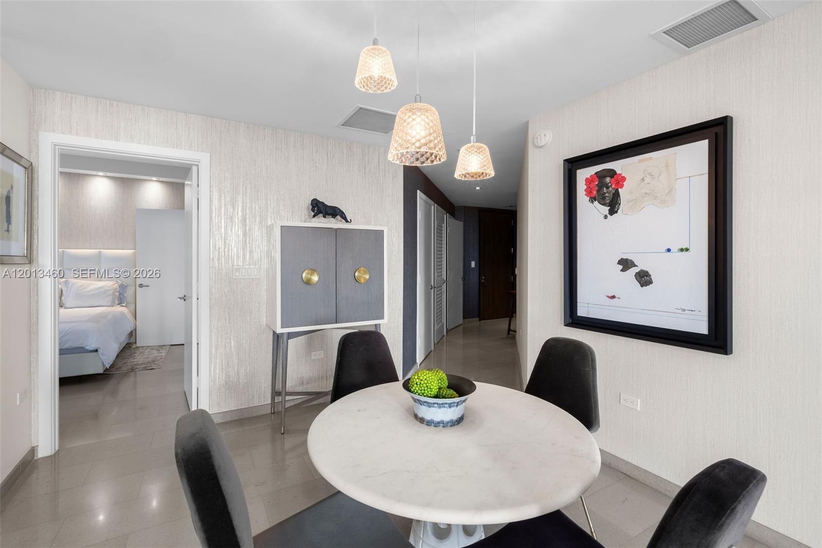 88 Southwest 7th Street, Unit 1201 Miami, FL 33130 - Photo 15 of 39 a view of a dining room with furniture