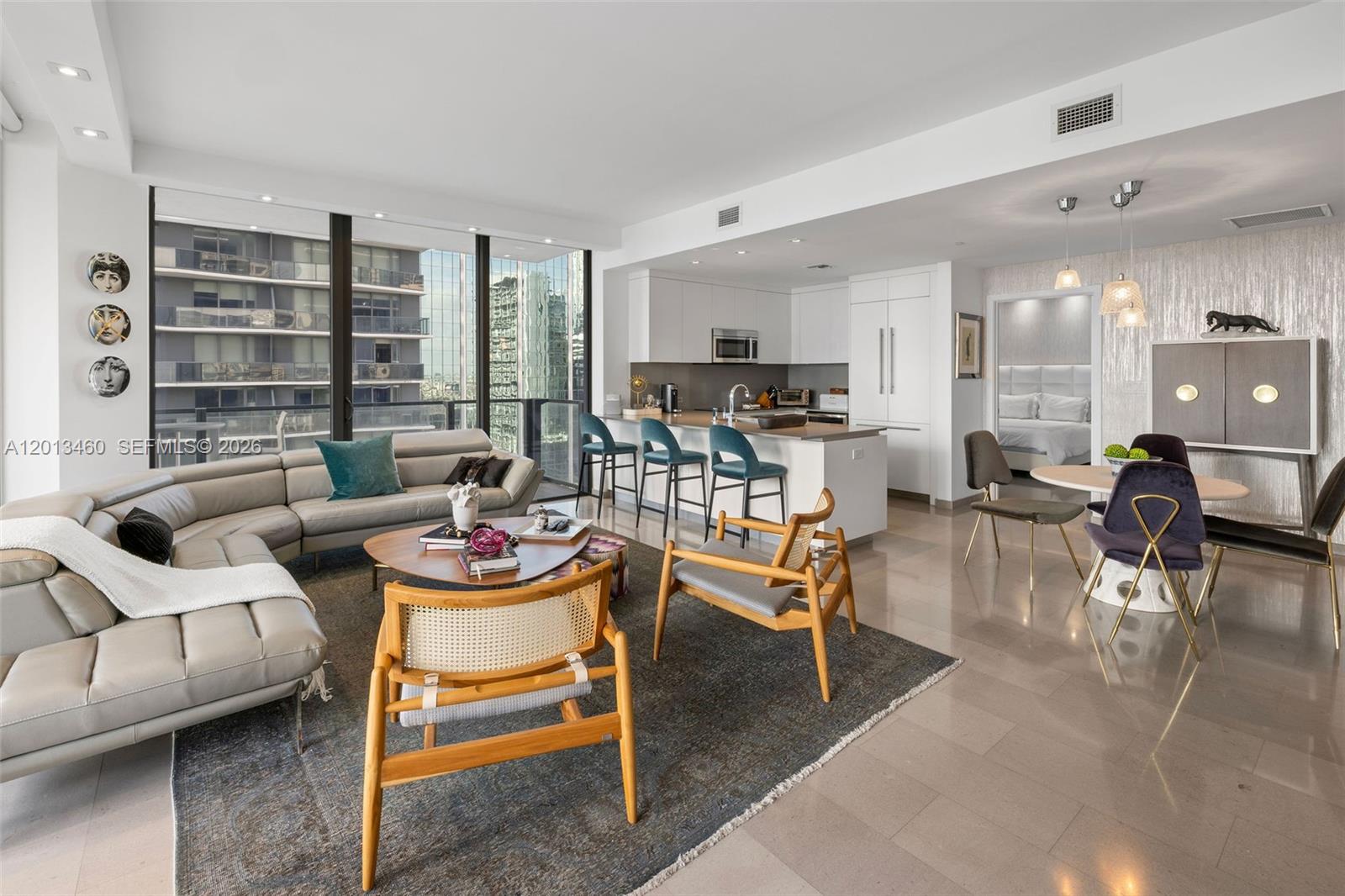 88 Southwest 7th Street, Unit 1201 Miami, FL 33130 - Photo 23 of 39 a living room with fireplace furniture and a large window
