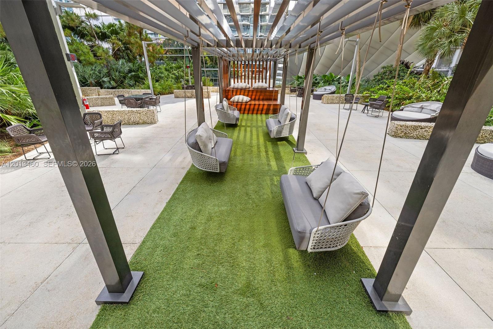 88 Southwest 7th Street, Unit 1201 Miami, FL 33130 - Photo 33 of 39 a view of swimming pool with a patio