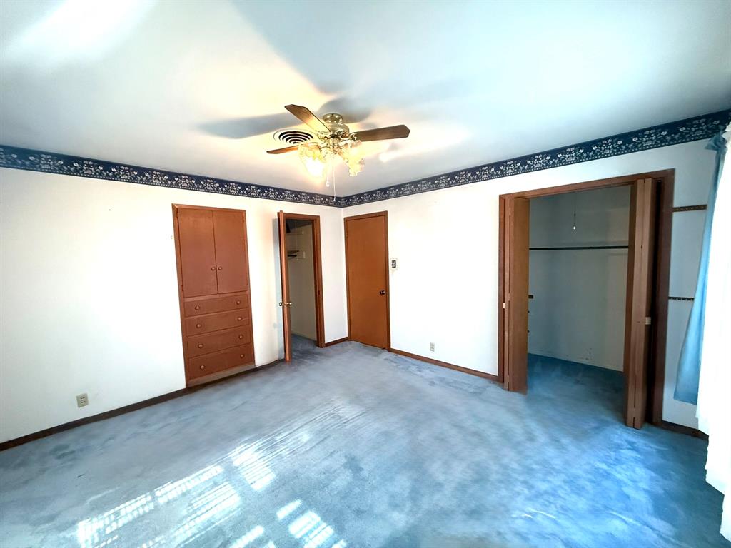 1537 Burns City Road Gainesville, TX 76240 - Photo 11 of 27 a view of an empty room with a window