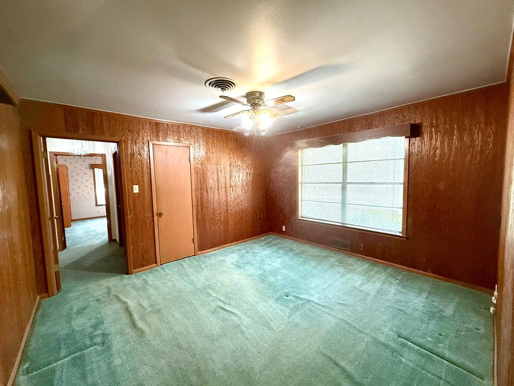 1537 Burns City Road Gainesville, TX 76240 - Photo 13 of 27 a view of an empty room with a window