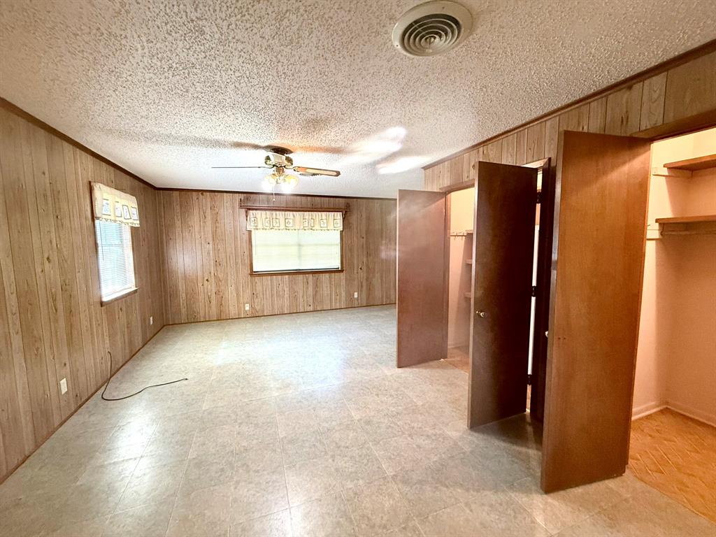 1537 Burns City Road Gainesville, TX 76240 - Photo 19 of 27 a view of a livingroom with a staircase