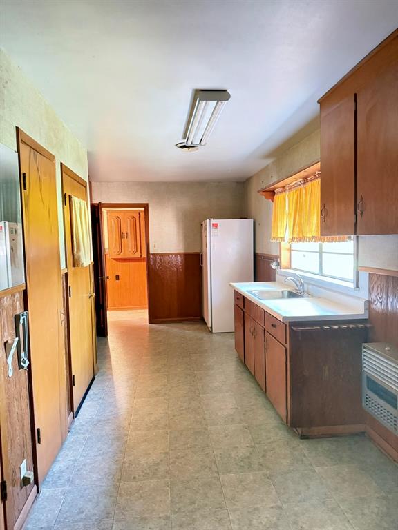 1537 Burns City Road Gainesville, TX 76240 - Photo 22 of 27 a view of kitchen with stainless steel appliances granite countertop a refrigerator and a stove