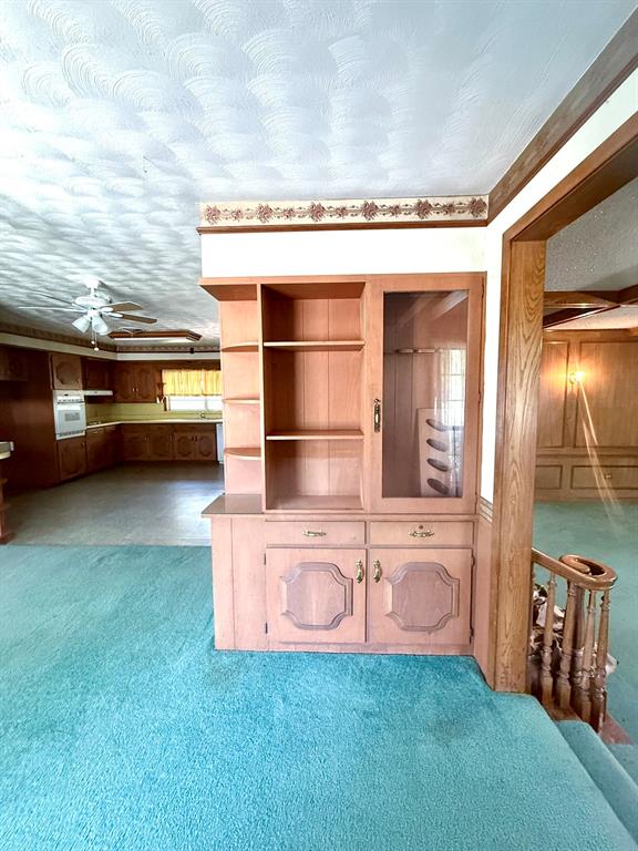 1537 Burns City Road Gainesville, TX 76240 - Photo 10 of 27 a view of a living room and utility room