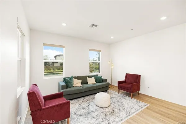 a living room with furniture and a table