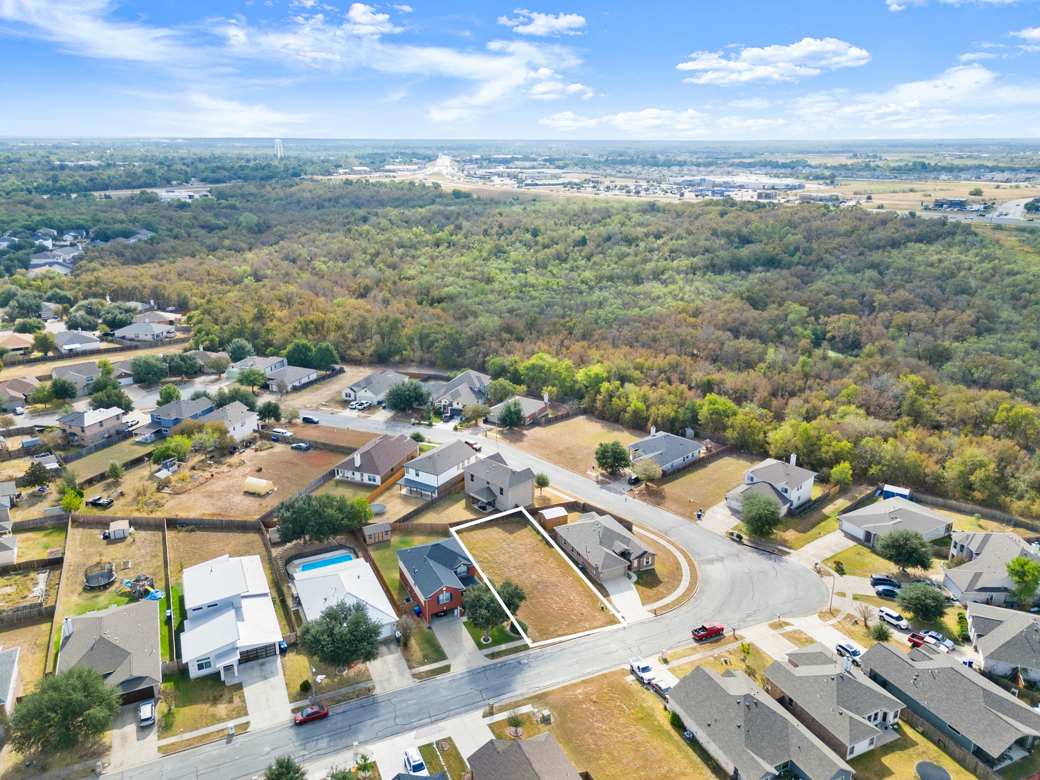406 Gettysburg Loop Elgin, TX 78621 - Photo 2 of 8 Discover a spacious residential lot offering ample space for a custom dream home, nestled in a well-established neighborhood.