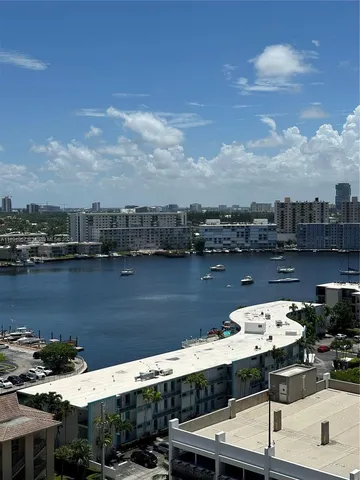 a view of a lake with sitting area
