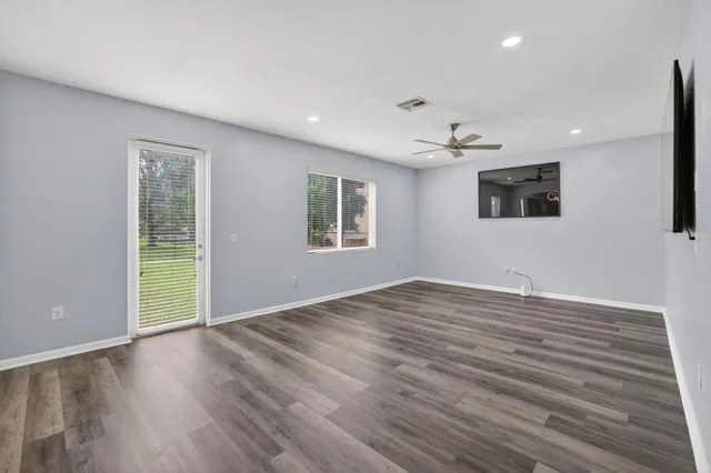 a view of livingroom with hardwood floor and window