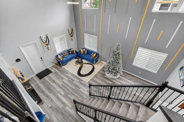 a bathroom with a granite countertop sink a toilet and a mirror