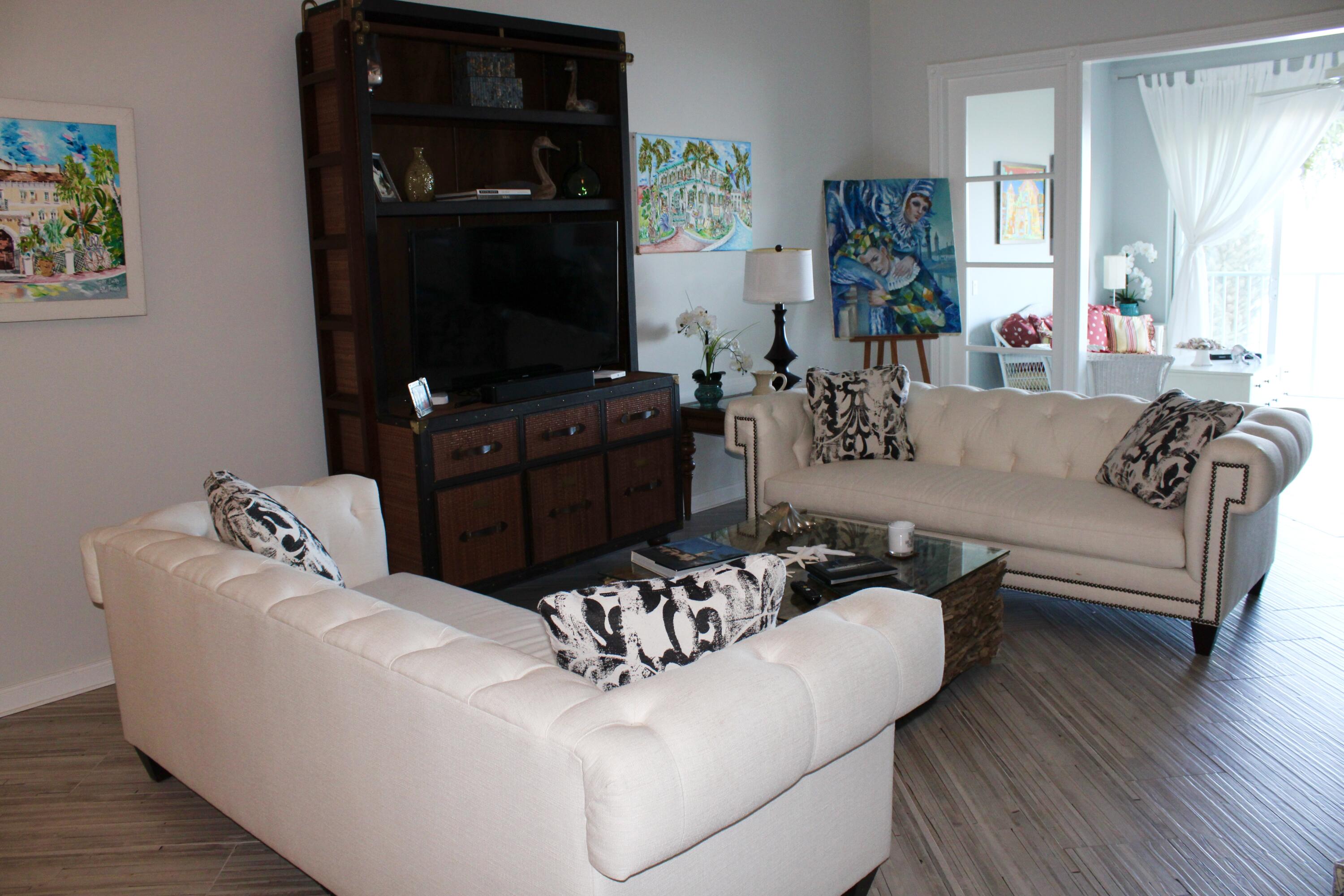 3 Harbour Isle Drive East, Unit 204 Fort Pierce, FL 34949 - Photo 8 of 21 a living room with furniture fireplace and a window