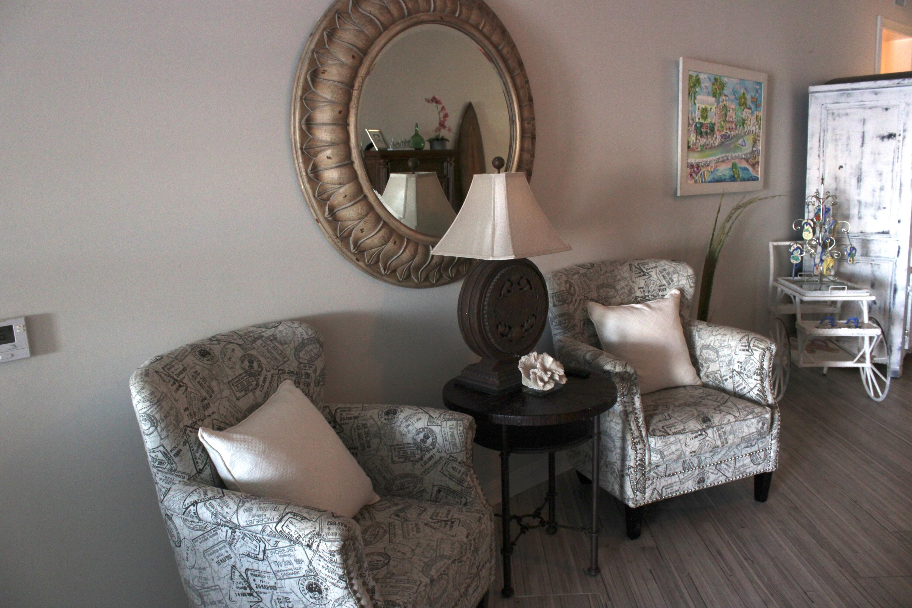 3 Harbour Isle Drive East, Unit 204 Fort Pierce, FL 34949 - Photo 9 of 21 a living room with furniture and a wooden floor