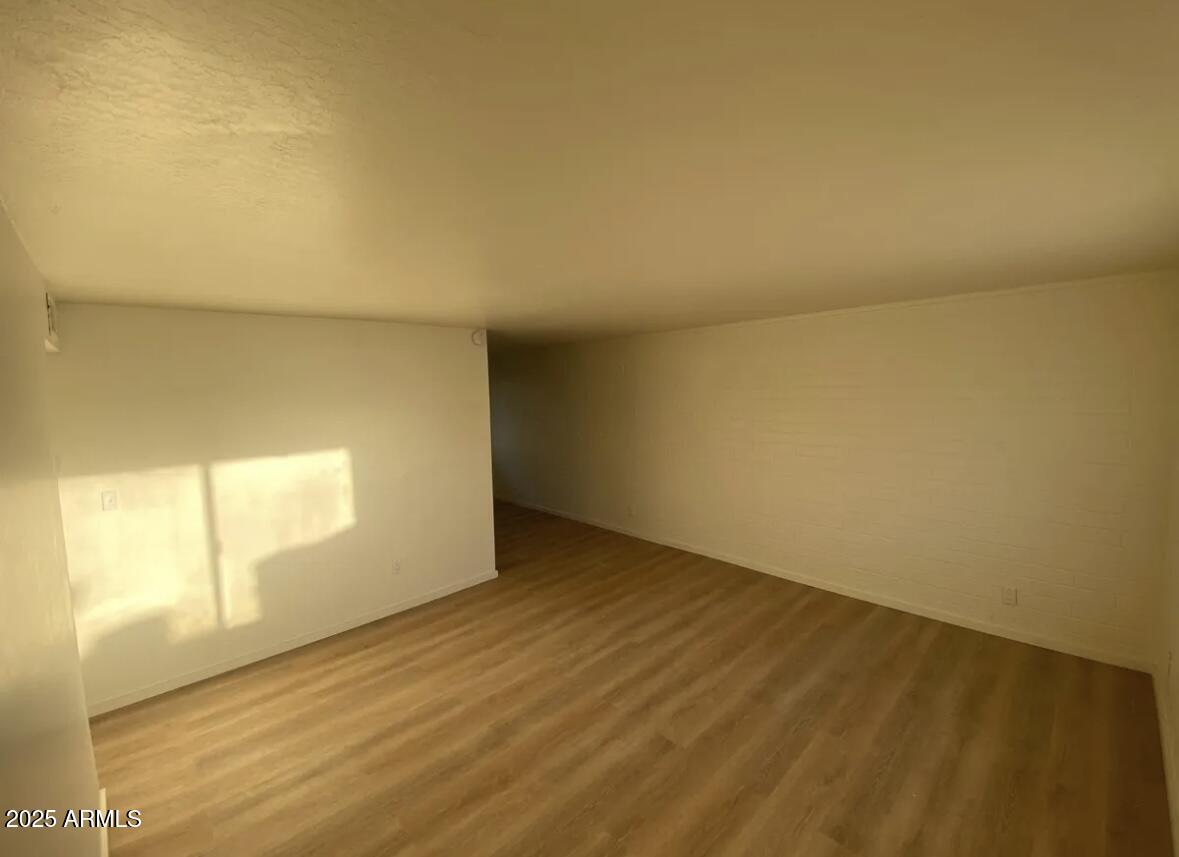 704 West 11th Street Casa Grande, AZ 85122 - Photo 5 of 10 a view of an empty room and window